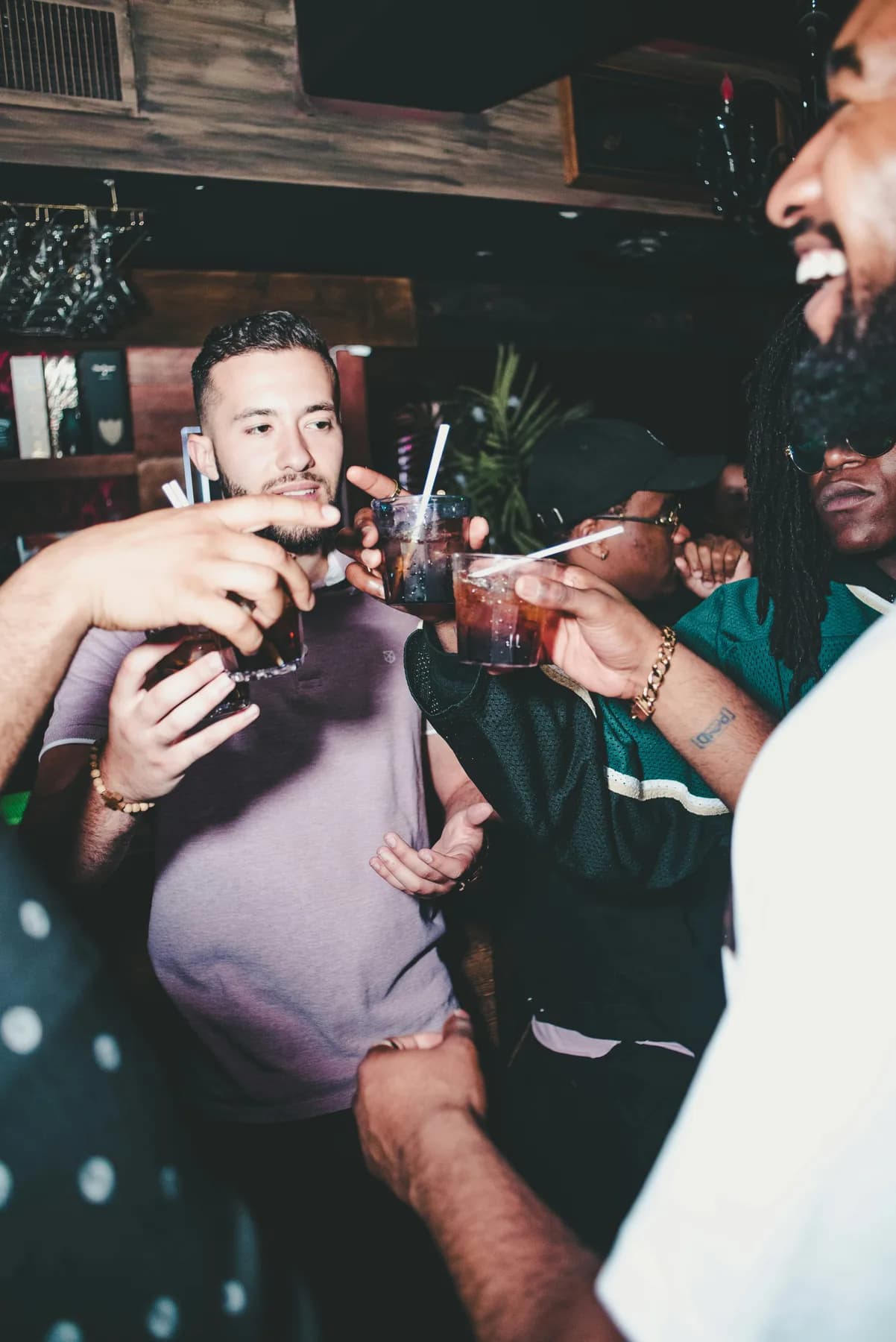 Friends raising their drinks during a celebration