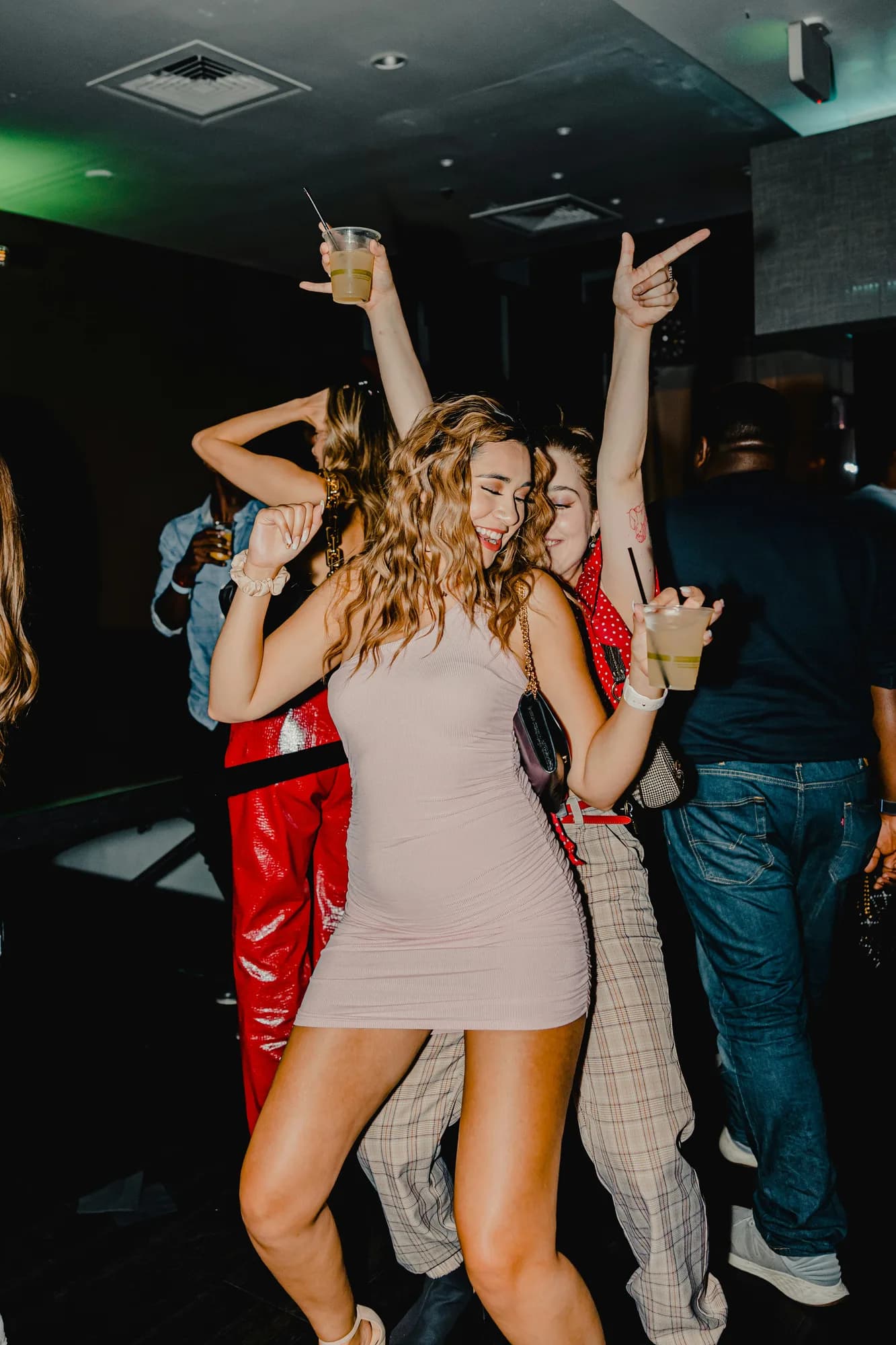 Friends dancing together at a party